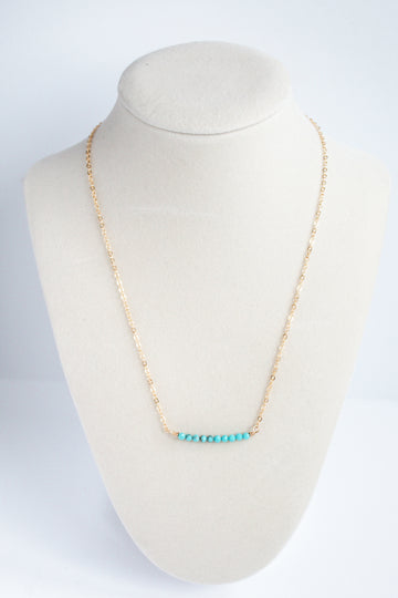 Moments and Milestone chain necklace with turquoise gemstone on a 14K gold-filled chain.