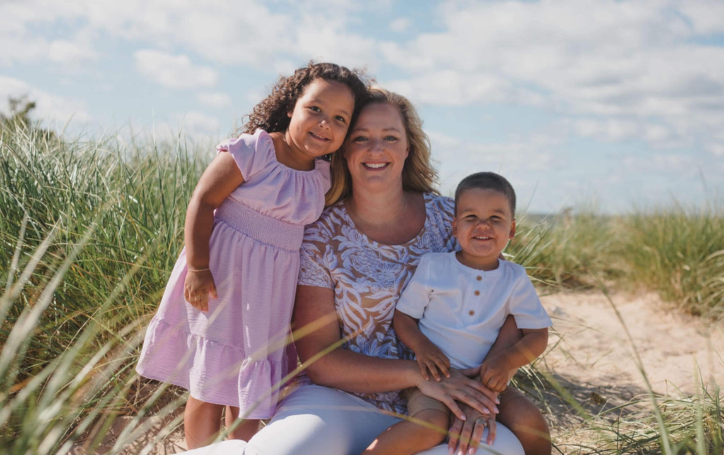 Busy mom and entrepreneur Becky balancing jewelry design and family time at home in Grand Haven Michigan.