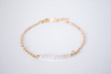 14k gold filled chain bracelet from the Moments and Milestone collection featuring faceted round clear quartz. 