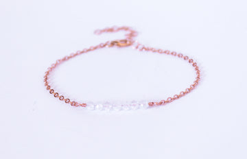 Moments and Milestone chain bracelet with clear quartz gemstones on a 14k rose gold filled chain.