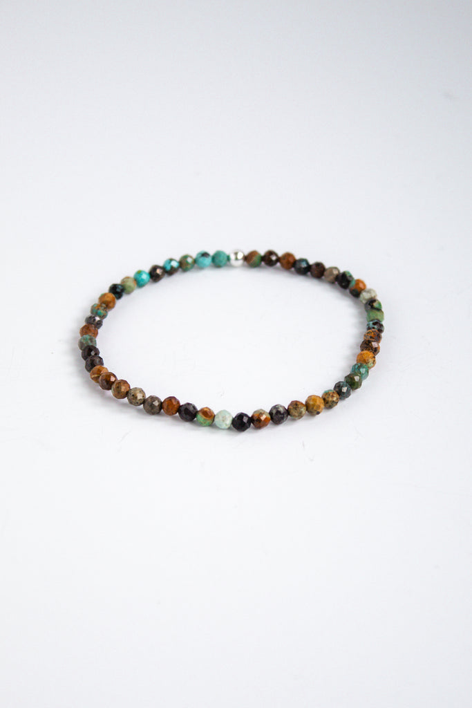 Fall collection gemstone stretch bracelet with turquoise beads, displayed on a clean white background