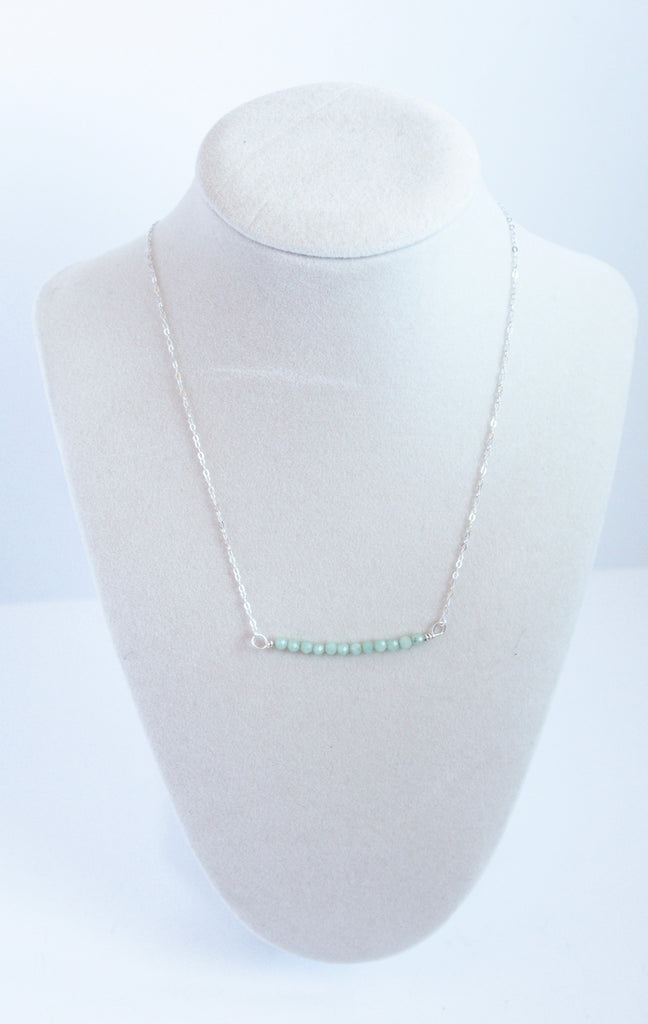 Moments and Milestone chain necklace with jade gemstone on a sterling silver chain.