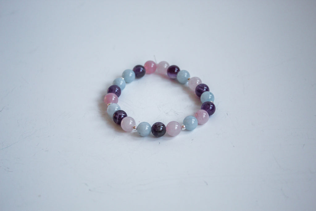 Close-up of a delicate gemstone bracelet from Mama’s Mini Collection.