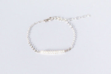 Sterling silver chain bracelet from the Moments and Milestone collection featuring 2mm pearls.