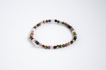 Fall collection gemstone stretch bracelet with mixed tourmaline beads, displayed on a clean white background