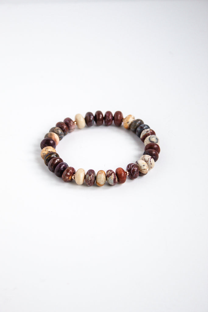 Mookaite gemstone and 14k rose gold filled spacer bead stretch bracelet with earthy tones, showcased on a white background.