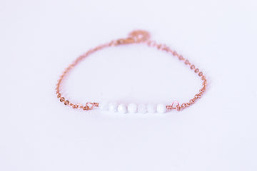 Moments and Milestone chain bracelet with moonstone gemstone on a 14k rose gold-filled chain.