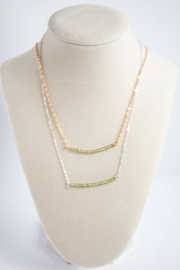 Moments and Milestone chain necklace with peridot gemstone on a 14K gold-filled and sterling silver chains.