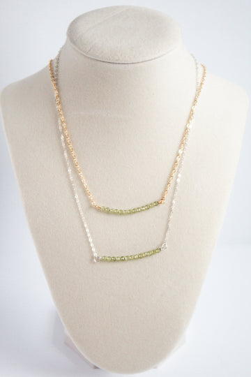 Moments and Milestone chain necklace with peridot gemstone on a 14K gold-filled and sterling silver chains.