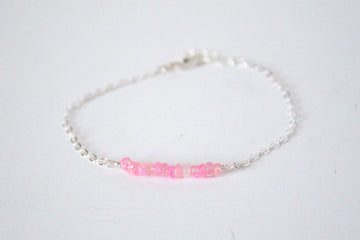 Moments and Milestone chain bracelet with pink opal gemstones on a sterling silver chain.