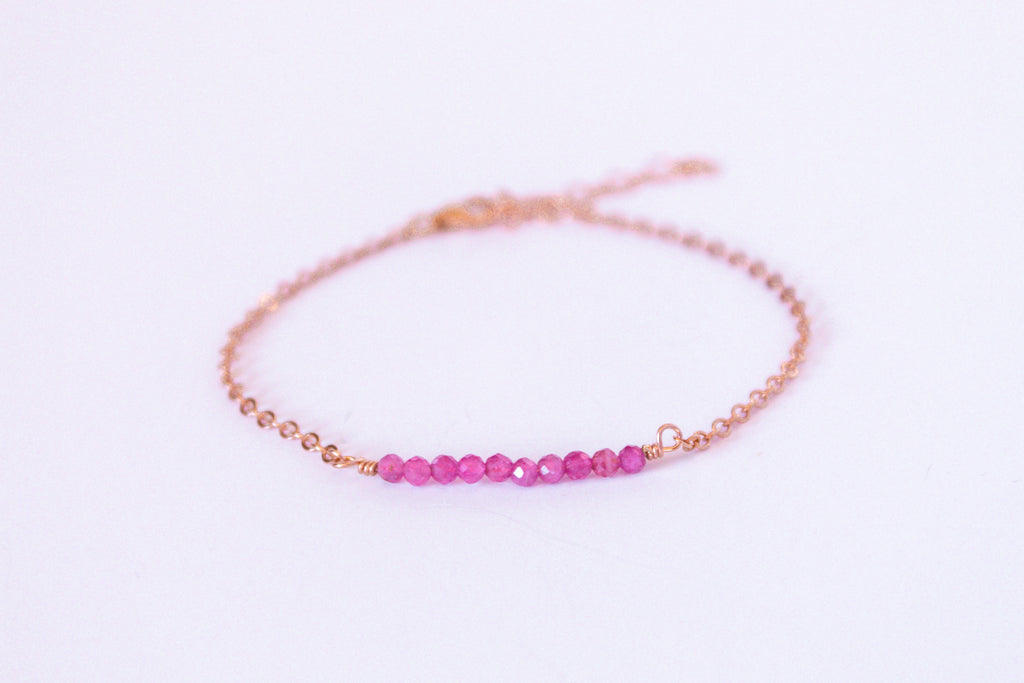 Moments and Milestone chain bracelet with pink tourmaline gemstones on a 14k rose gold filled chain.