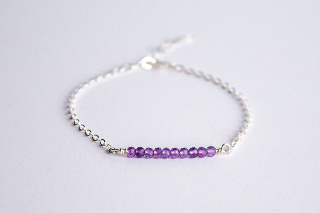 Moments and Milestone chain bracelet with purple amethyst gemstones on a sterling silver chain.