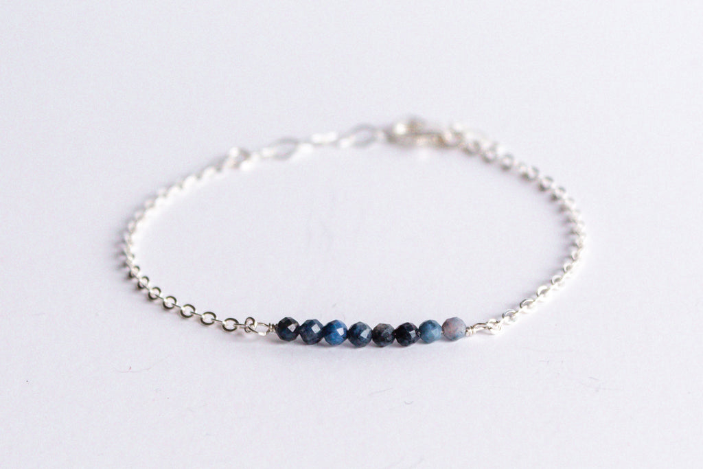 Moments and Milestone chain bracelet with sapphire gemstones on a sterling silver chain.