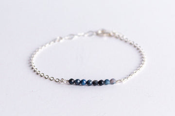 Moments and Milestone chain bracelet with sapphire gemstones on a sterling silver chain.