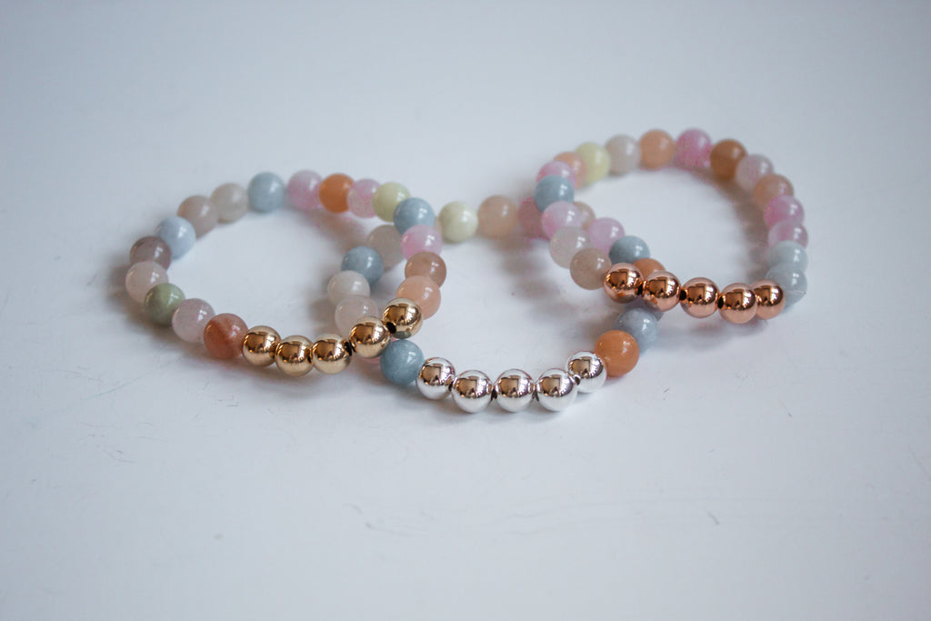 Adjustable dainty bracelet with sterling silver and gemstones.