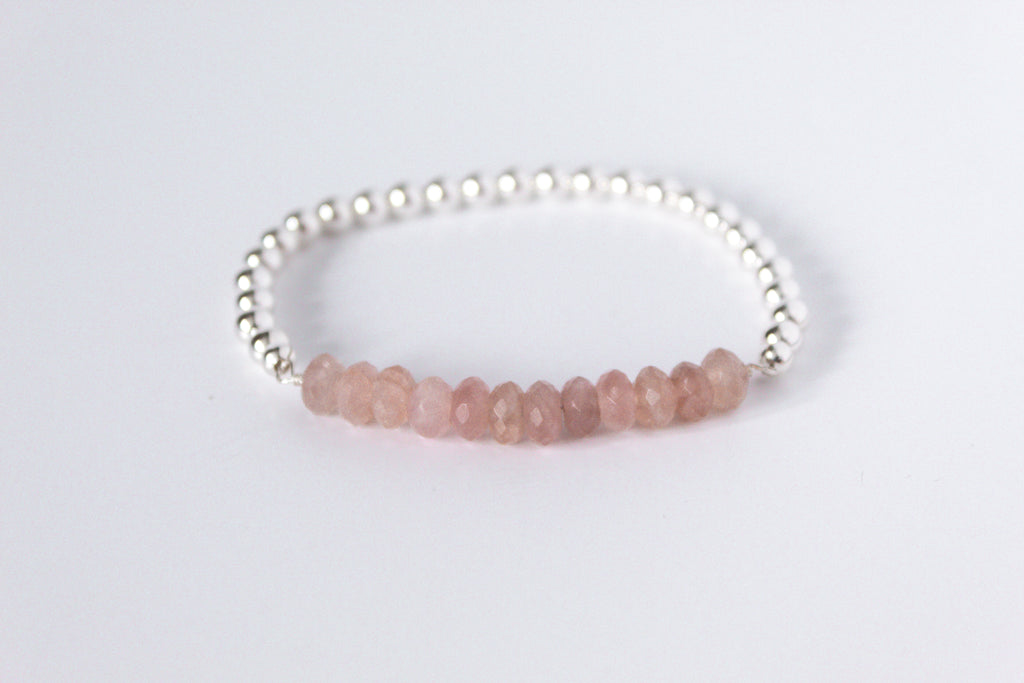 Strawberry quartz perfect balance Bracelet on a white background