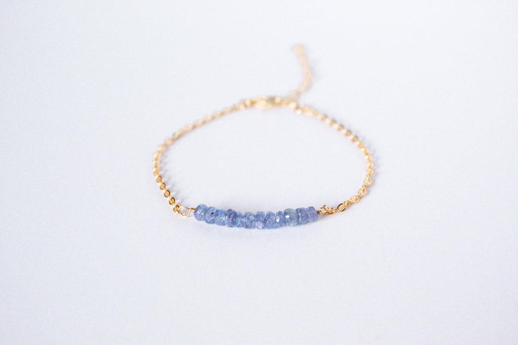 Moments and Milestone chain bracelet with tanzanite gemstones on a 14k gold filled chain.