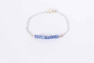 Moments and Milestone chain bracelet with tanzanite gemstones on a sterling silver chain.