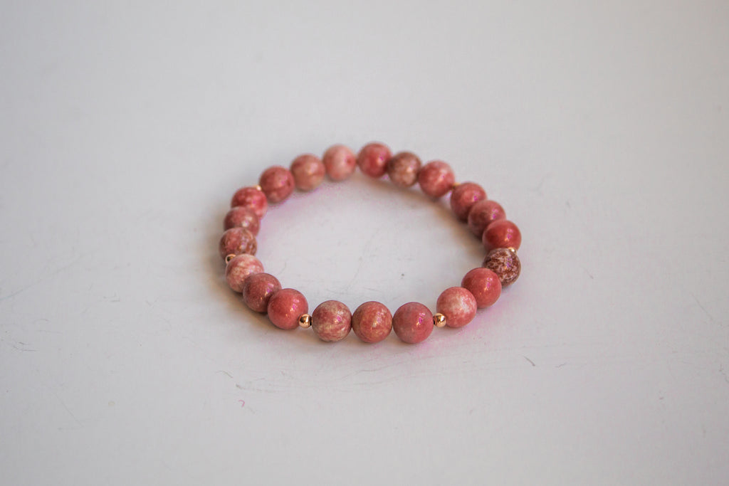 Mama’s Mini Collection featuring AAA Thulite beads with 14k rose gold filled beads, photographed on a simple white background for a minimalist look.