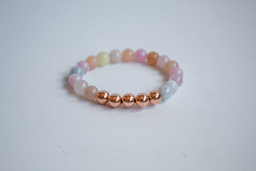 Handcrafted bracelet with natural stones and gold accents