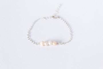 Sterling silver chain bracelet from the Moments and Milestone collection featuring 5mm pearls.