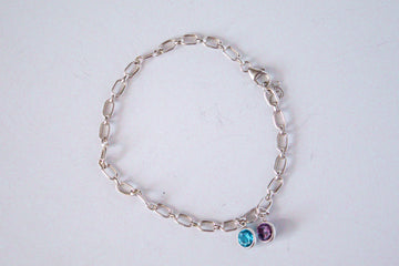 Sterling silver abby chain bracelet with June and September cz bezel charms for added meaning. 